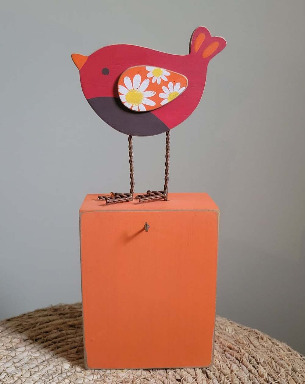 Silvestri Whimsical Wooden Bird Figurine on Orange Display Stand